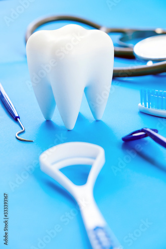 Dental model and dental equipment on blue background  concept image of dental background. dental hygiene background