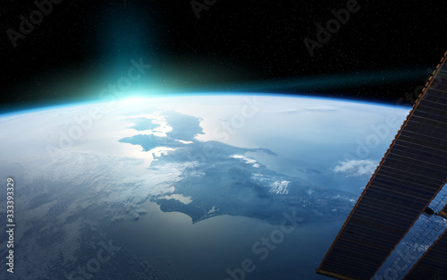 Fototapeta Naklejka Na Ścianę i Meble -  View of planet Earth from a space station window during a sunrise 3D rendering elements of this image furnished by NASA