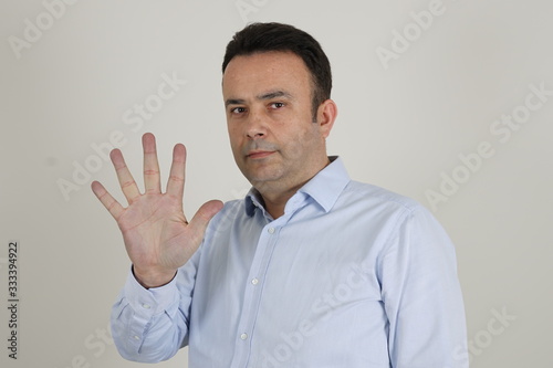 bussiness man showing number with finger © Stoker20