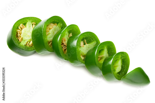 sliced jalapeno peppers isolated on white background. Green chili pepper. Capsicum annuum.