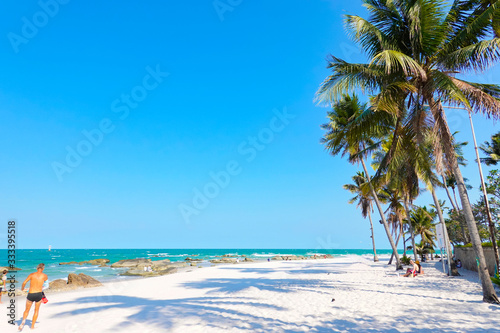 Ocean waves on the sandy beach for background, concept of the beach in the summer © Kenstocker