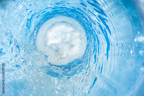 Background with a radial swirl of blue clear water