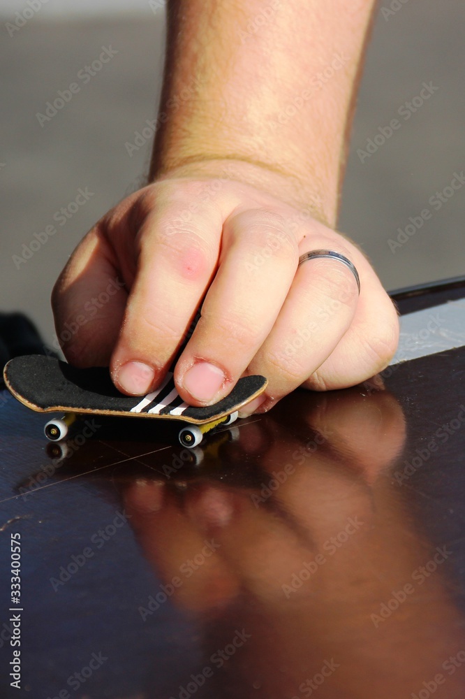 teenager plays the fretboard close-up. competitions in vulture, freestyle and hurdles. home games in quarantine teenager plays the fretboard close-up. competitions in vulture, freestyle and hurdles. home games in quarantine