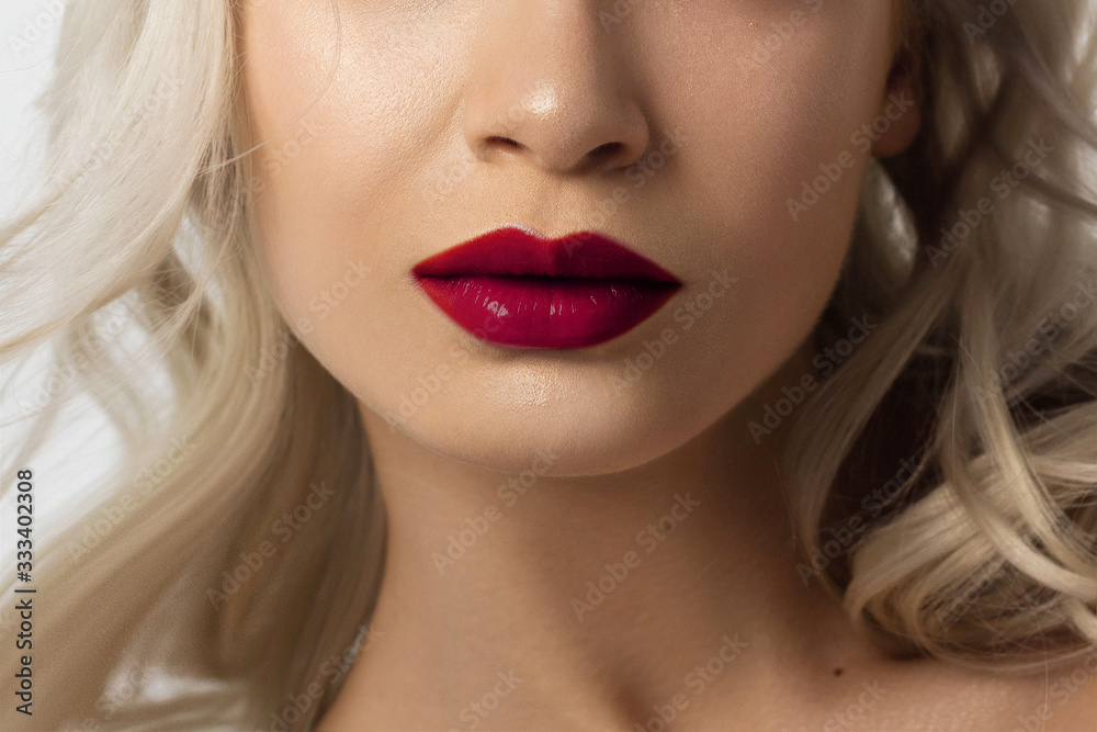 Sexual full lips. Pink gloss of lips and woman's skin. The mouth is closed. Increase in lips, cosmetology. red lipstick. Open mouth and with teeth. blonde hair. Sexual full lips. Pink gloss of lips and woman's skin. The mouth is closed. Increase in lips, cosmetology. red lipstick. Open mouth and with teeth. blonde hair.