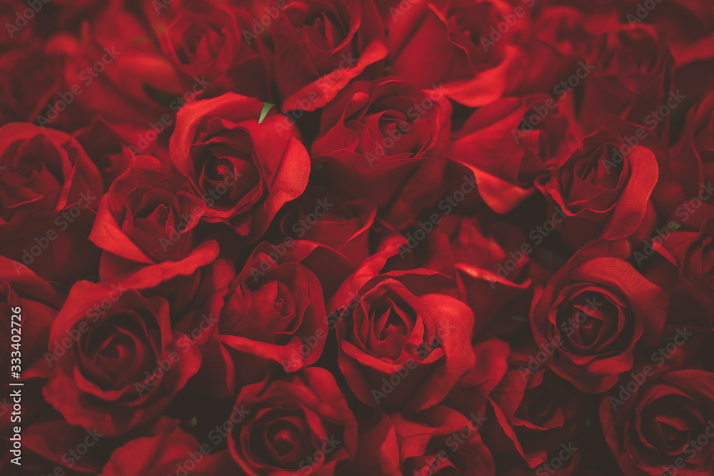 Naklejka premium Bouquet of artificial red roses