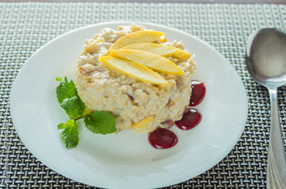 Healthy eating Oatmeal porridge with mango and mint Healthy eating Oatmeal porridge with mango and mint