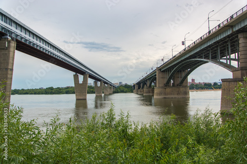 Wallpaper Mural Railway and road bridge over a large river. Two bridges Torontodigital.ca