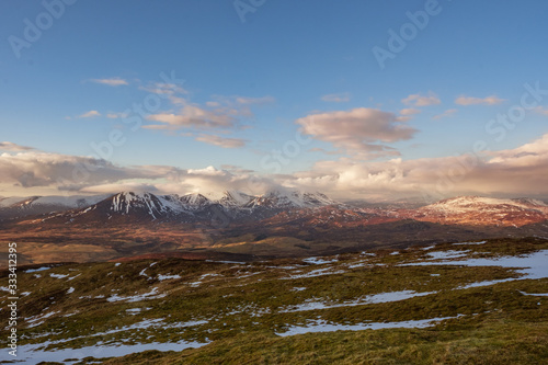 View of Cairngorm mountains from Ben Vrackie in the evening