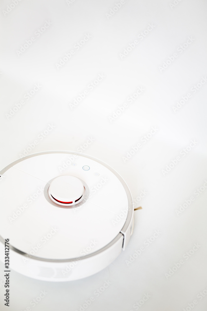 white robot cleaner on a white background white robot cleaner on a white background