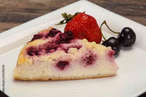 Cheesecake with cherry served strawberry