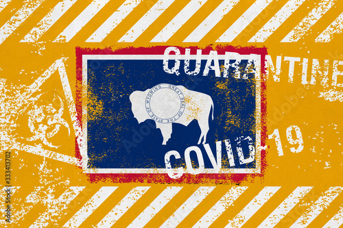 Flag of the state of Wyoming on grunge background with COVID-19 and QUARANTINE symbols on it. Novel Coronavirus (2019-nCoV) concept, for an outbreak occurs in Wyoming, US.