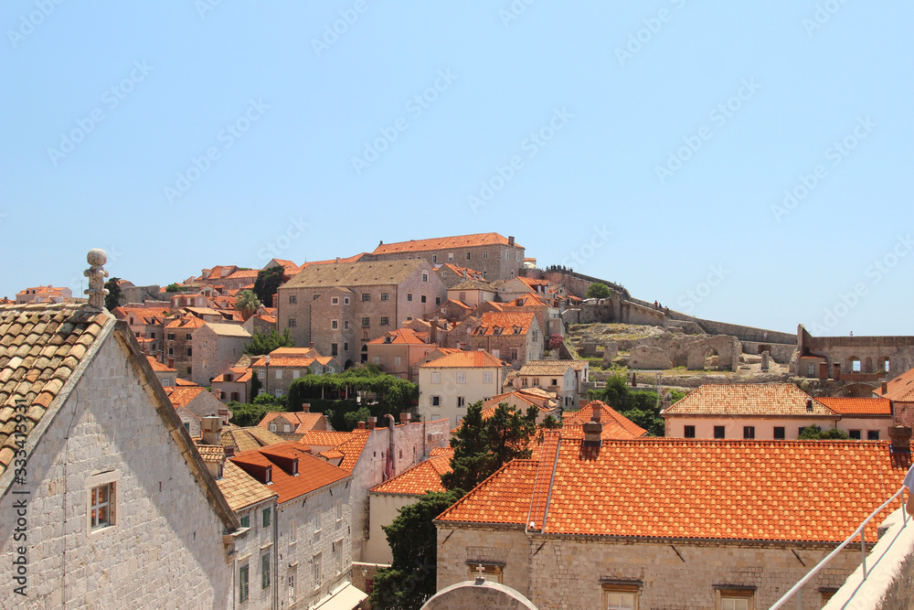 Landscape views of the beautiful orange houses in the town of Dubrovnik, Croatia.
