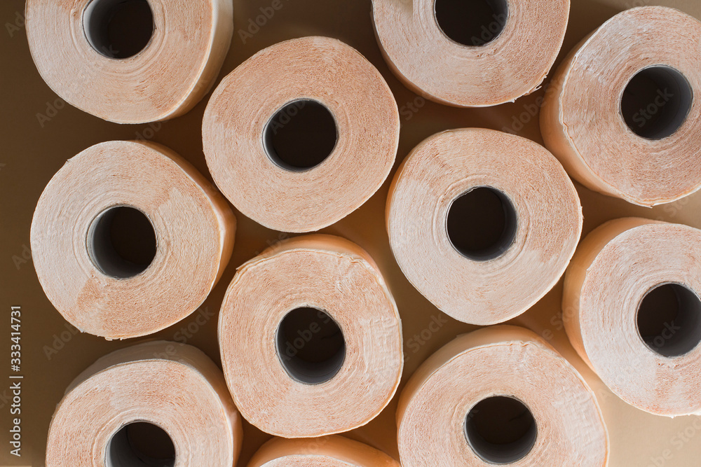 peach beige toilet paper pattern on beige background peach beige toilet paper pattern on beige background
