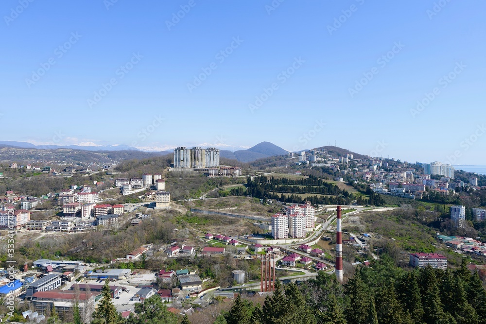 top view of the spring panorama of the southern city with sea and mountain horizon