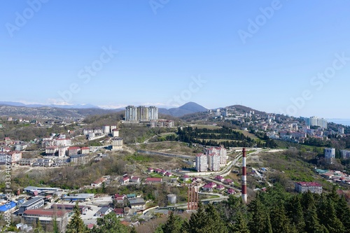 top view of the spring panorama of the southern city with sea and mountain horizon © Aleda