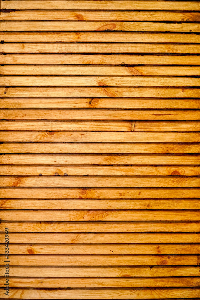 Wooden background made of thin slats or plank Wooden background made of thin slats or plank