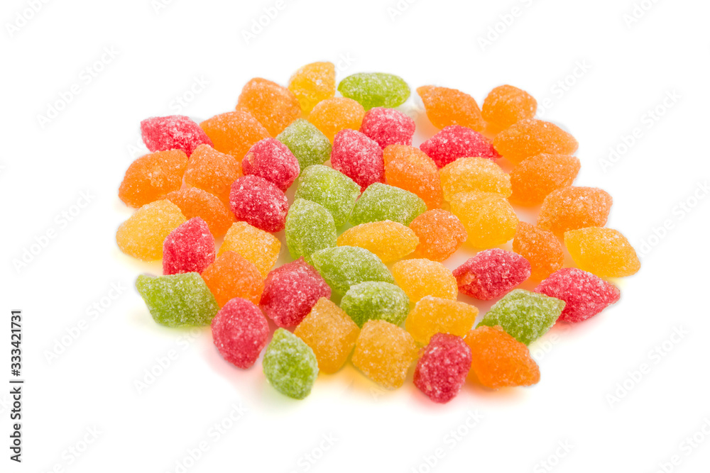 Pile of multicolored candies isolated on white background. close up, side view. Pile of multicolored candies isolated on white background. close up, side view.