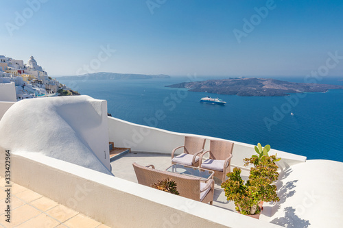 Luxury summer landscape and vacation concept. Perfect couple travel destination background. White architecture on Santorini island, Greece. Beautiful tranquil landscape, blue sea view.