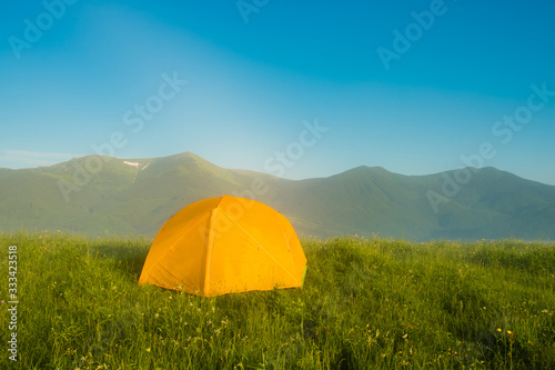 Tourist camping tent in a mountains. Carpathian  Ukraine  Europe. Beauty world.