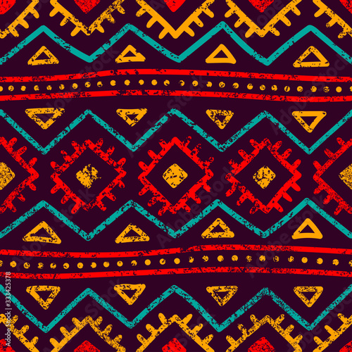 Seamless tribal pattern. Grunge texture. Bohemian style print. Vector illustration.