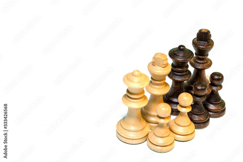 Isolated closeup to chess pieces over white background. Represent teamwork, strategy, power, battle, logic game. Isolated closeup to chess pieces over white background. Represent teamwork, strategy, power, battle, logic game.