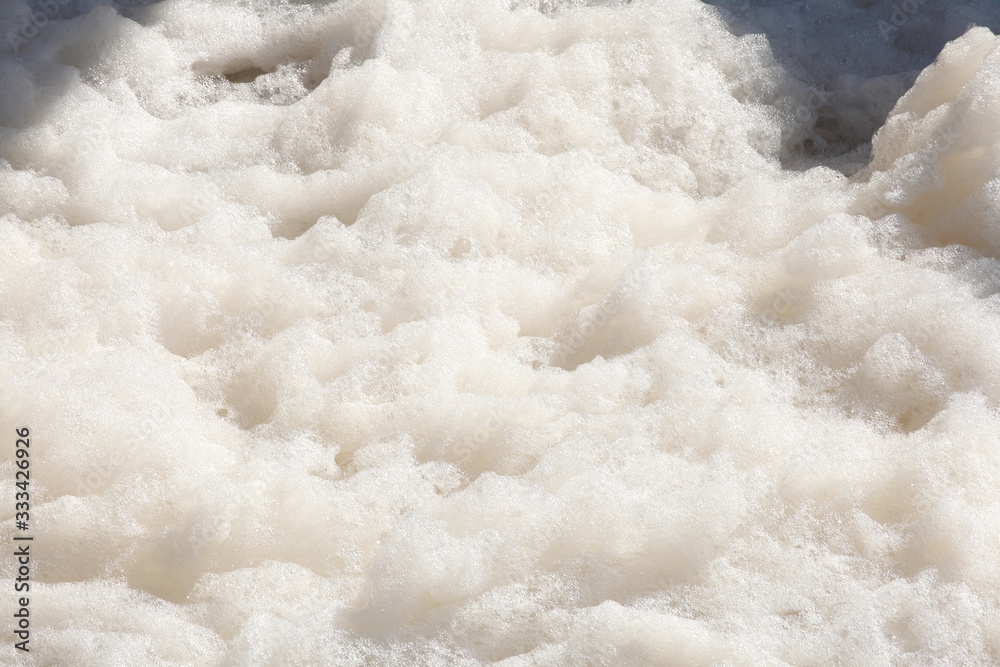 Foaming water in a river, Germany, Europe Foaming water in a river, Germany, Europe