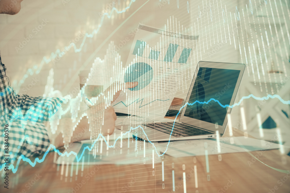 Double exposure of financial graph with man works in office on background. Concept of analysis. Double exposure of financial graph with man works in office on background. Concept of analysis.