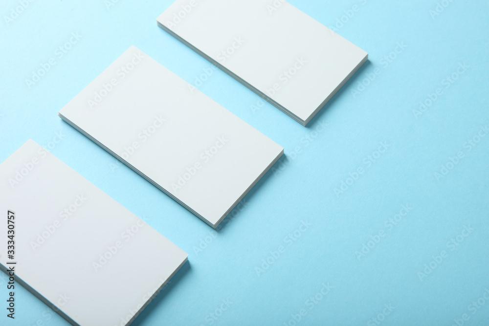 business cards on a colored background top view. Place to insert text business cards on a colored background top view. Place to insert text