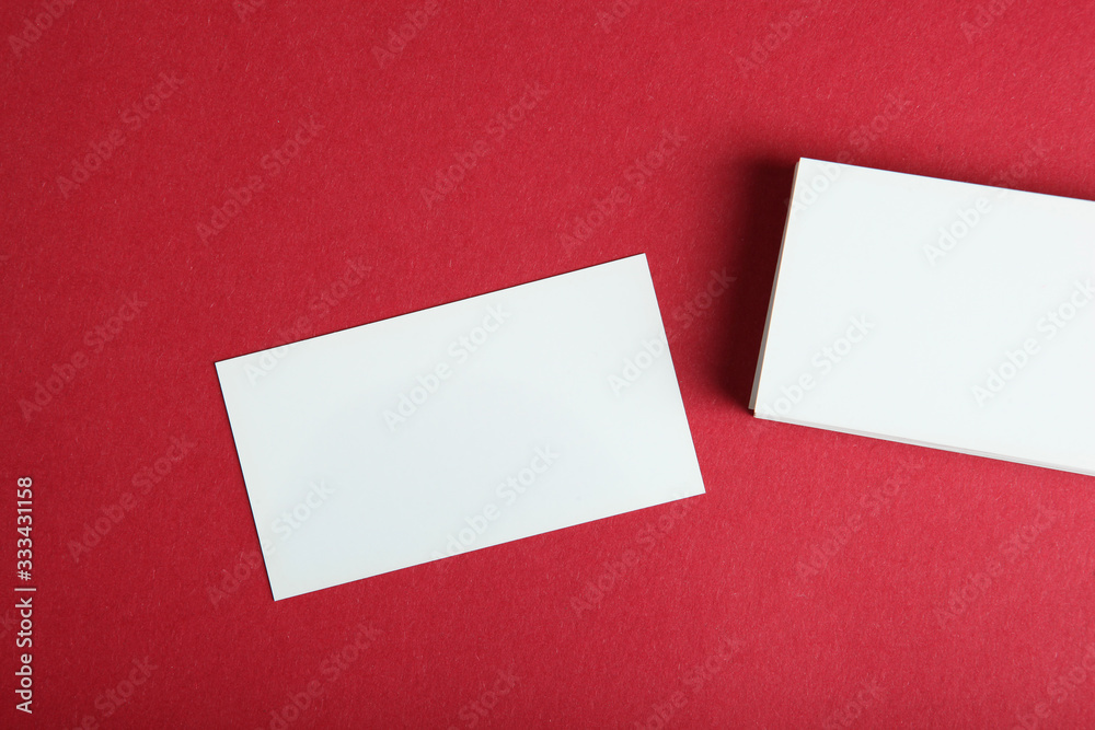 business cards on a colored background top view. Place to insert text business cards on a colored background top view. Place to insert text