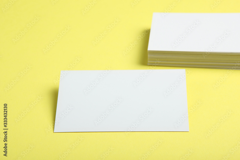business cards on a colored background top view. Place to insert text business cards on a colored background top view. Place to insert text