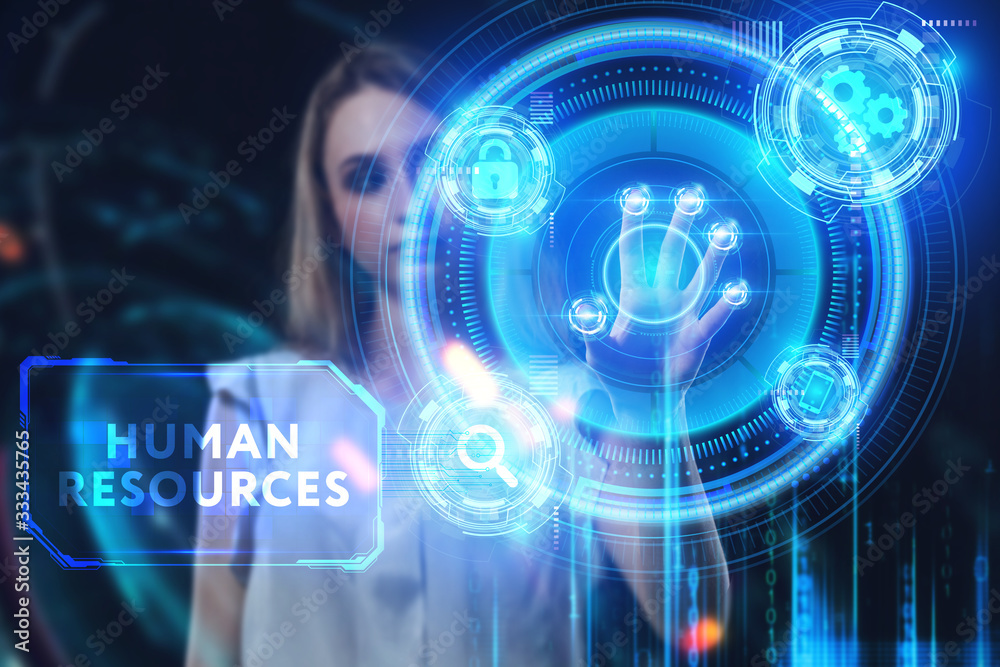 Business, Technology, Internet and network concept. Young businessman working on a virtual screen of the future and sees the inscription: Human resources Business, Technology, Internet and network concept. Young businessman working on a virtual screen of the future and sees the inscription: Human resources