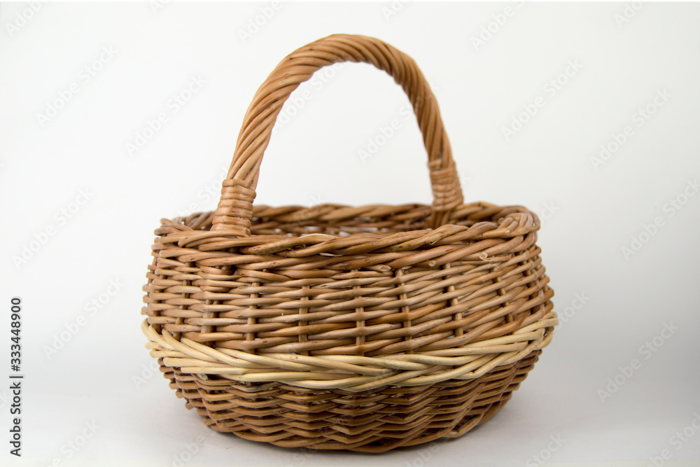 empty wicker basket isolated on white background