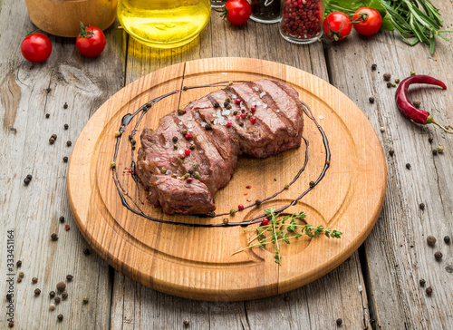 fried steak on bone photo