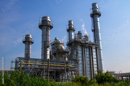 Turbine generator in power plant with blue sky