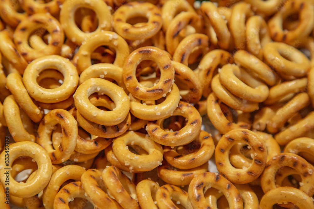 Baked round sushki sprinkled with salt. Traditional snack in Russia Baked round sushki sprinkled with salt. Traditional snack in Russia