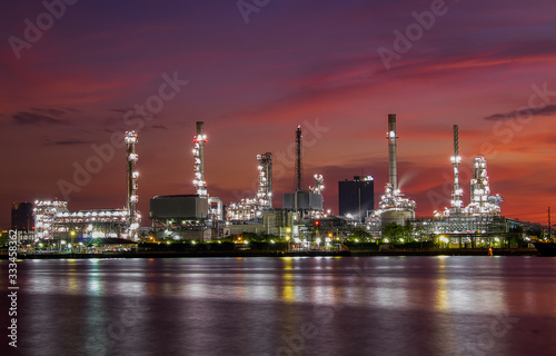 Oil refinery industry and Petrochemical and natural gas and oil storage tanks, blue background
