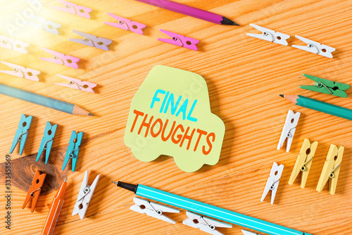 Word writing text Final Thoughts. Business photo showcasing the conclusion or last few sentences within your conclusion Colored clothespin papers empty reminder wooden floor background office photo