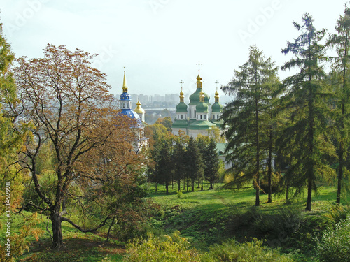 View of the Botanical Garden and Vydubetsky Monastery in Kiev on an autumn day photo