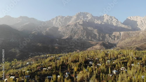 Wallnut forest of Arslanbob with High mountain in the background