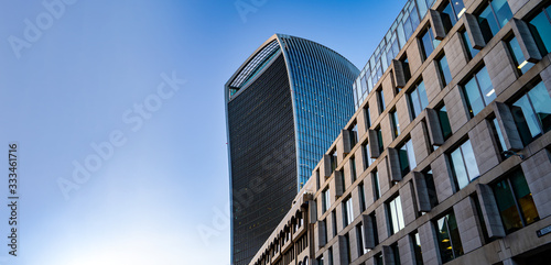 Photography Modern skyscrapers towering over other buildings