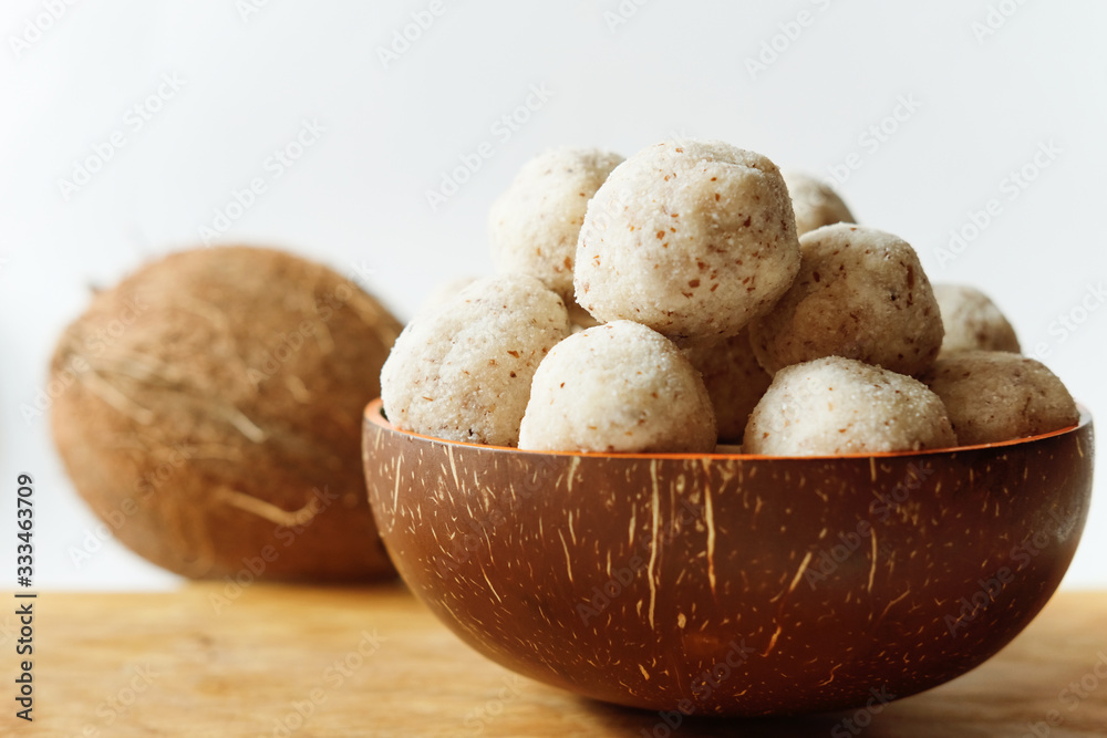 homemade coconut energy balls with almond. healthy sugar free concept. keto diet recipe. close up view. homemade coconut energy balls with almond. healthy sugar free concept. keto diet recipe. close up view.