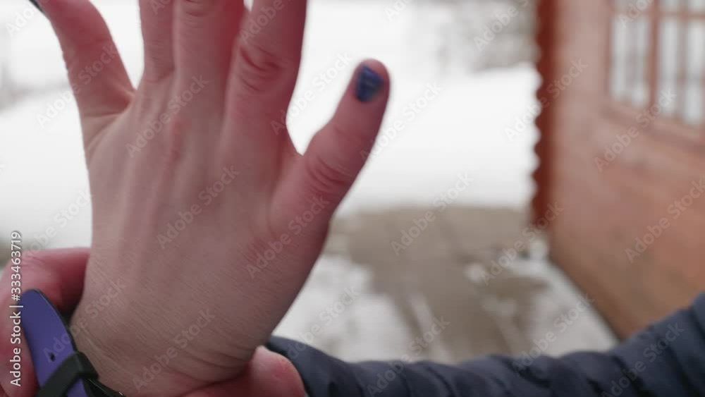 Close up view of woman's hand guesturing infront of man and shows stop gesture, explaining something. Man grabs her hand and stopping woman gesturing. Domestic violance. Close up view of woman's hand guesturing infront of man and shows stop gesture, explaining something. Man grabs her hand and stopping woman gesturing. Domestic violance.