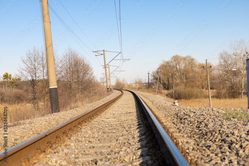 View of the railway track. Ascending railway track.The railway disappears in the distance.