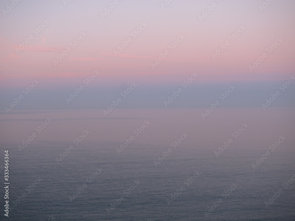 Mist on the sea at sunset