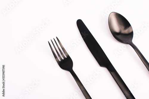 top view of knife, fork and spoon isolated on white