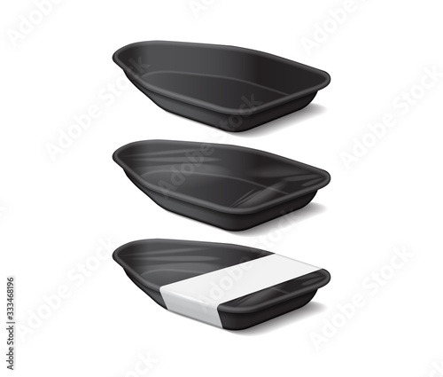 Food plastic black tray with white label. Styrofoam food storage. Dark foam meal container, empty box for food. Side view. For your design