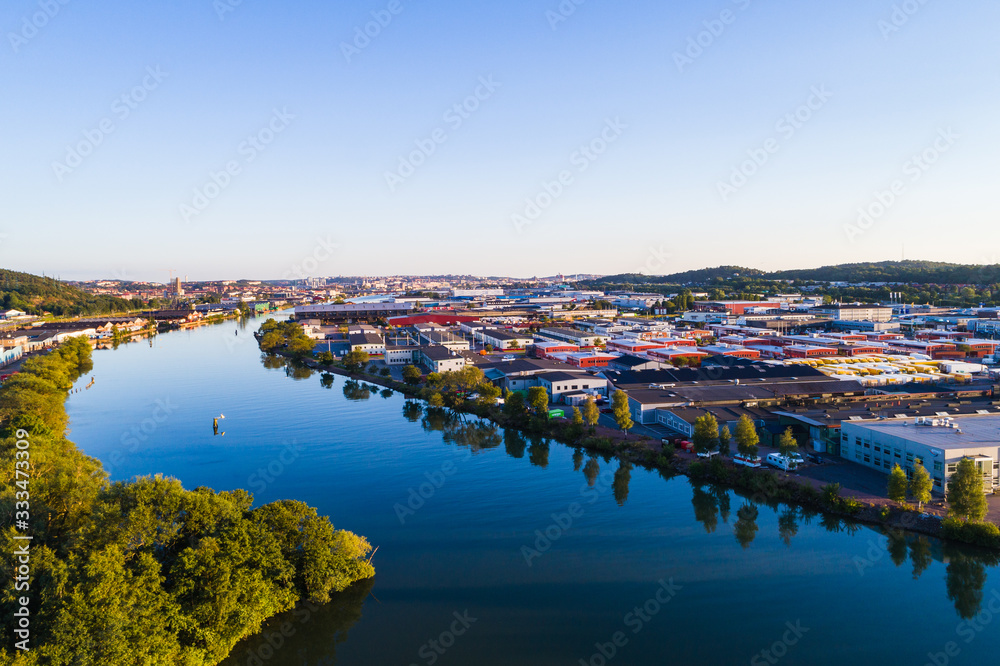 Aerial view of calm river amidst buildings in city of Gothenburg, Sweden.