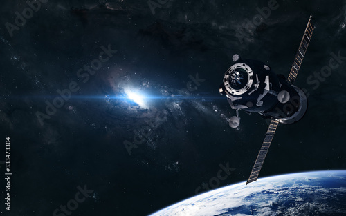 Fototapeta Naklejka Na Ścianę i Meble -  Space station on the background of a bright star in the center of the galaxy. Deep space planet. Science fiction. Elements of this image furnished by NASA