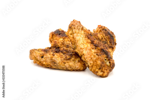 Grilled chicken wings isolated on white background