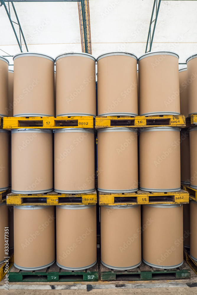 oil barrels or chemical drums stacked up, barrels made from fiber